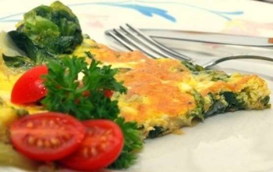 Omlette with cheese and dandelion flowers